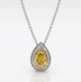 rosetón oro blanco 18k y diamantes. Diamante fancy vivid yellow.